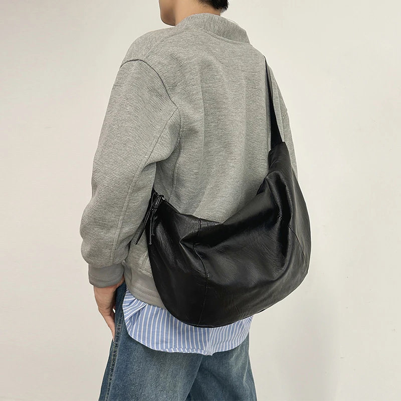 

Casual Commuter Soft Leather Men's Dumpling Bag Single Shoulder Crossbody Motorcycle Riding Bag Fashionable Simple Large Capa...