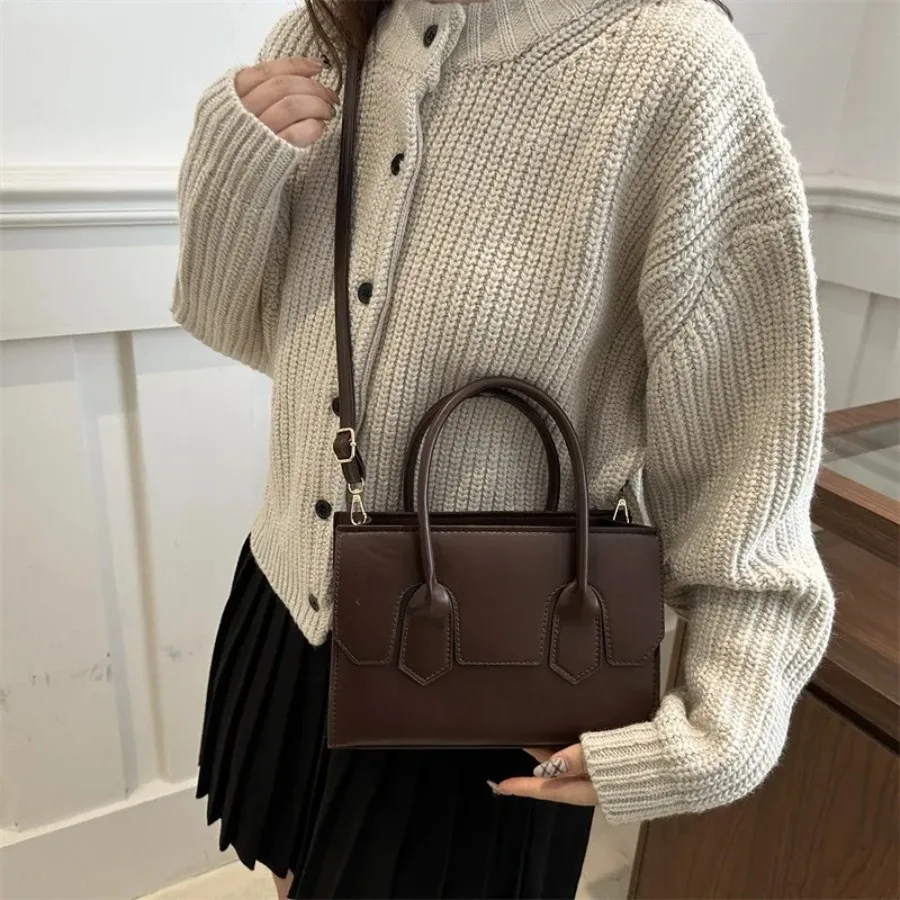 

Spring and summer new fashion shoulder bag retro senior sense of hand-held commuting hundred with simple diagonal cross bags