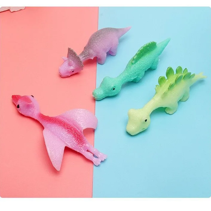 5 pezzi di dinosauro che salta giocattolo divertente dardo da dito tiro piccolo dinosauro decompressione giocattolo in gomma morbida regalo per bambini di famiglia