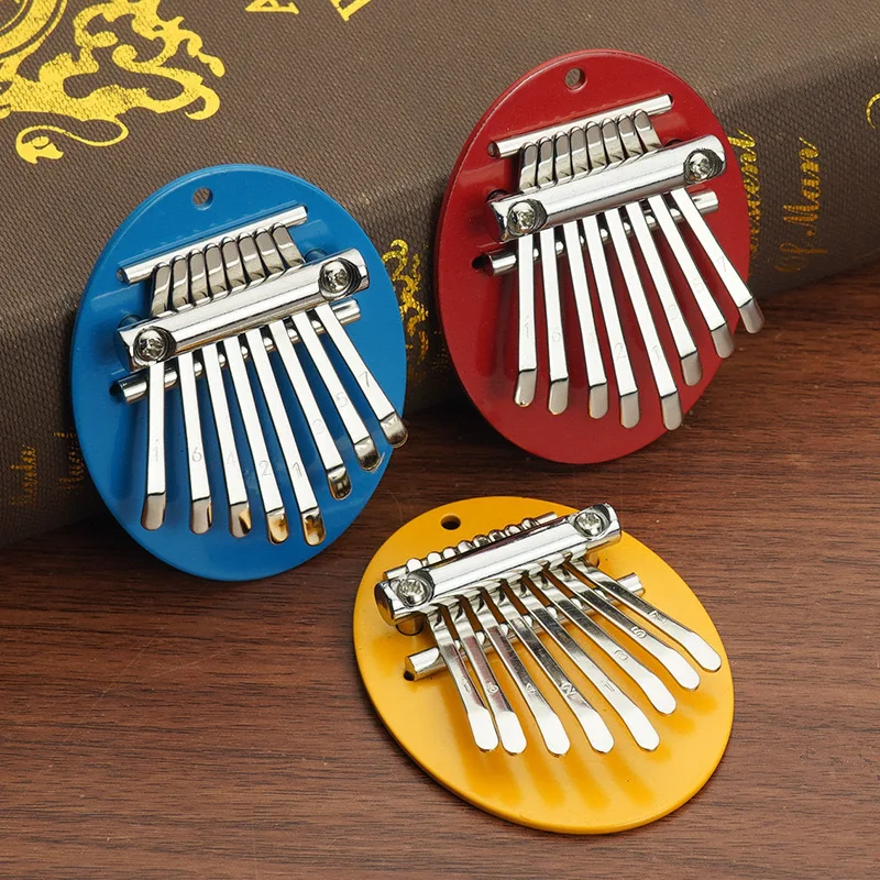 8 Keys Mini Kalimba Thumb Piano Portable Finger Piano Cute Pendant Toy for Kids Beginners with Metal Base