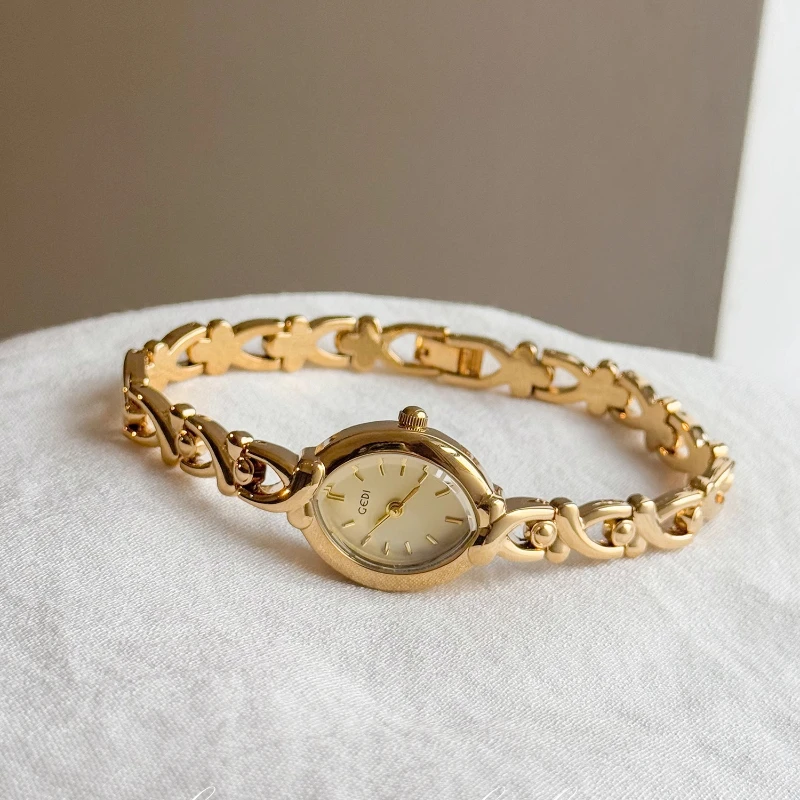 2025 Exquisite Gold Bracelet Women's Quartz Watch Creative Clock Waterproof Steel Belt Fashion Women's Watch Luxury