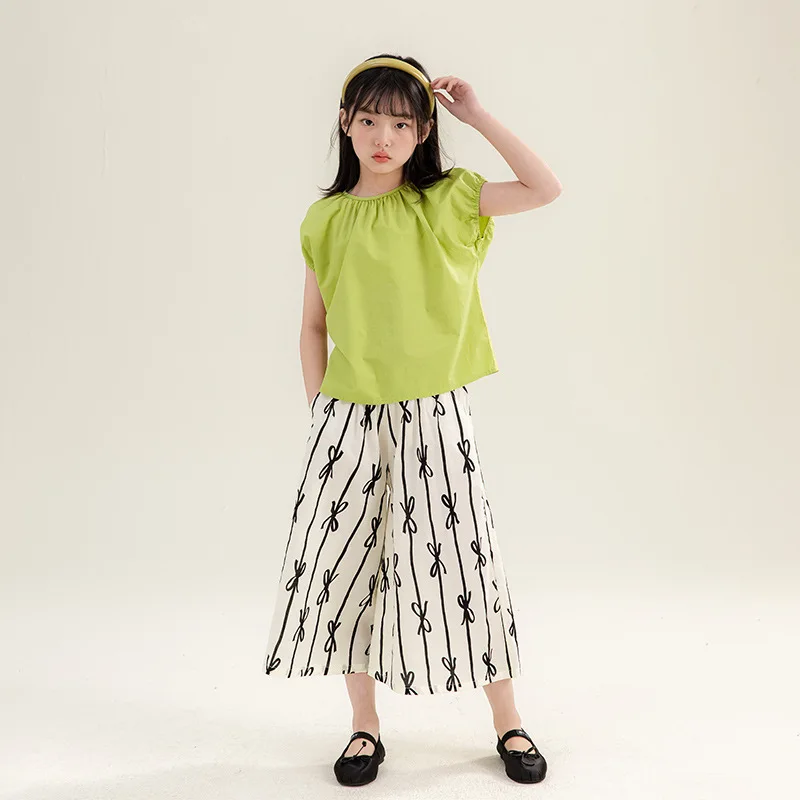 

2024 Korean Summer School Girl 2PCS Clothes Set Children Girl O-neck Solid Tops+Bowknot Wide-leg Pants Kids Girl Casual Suit