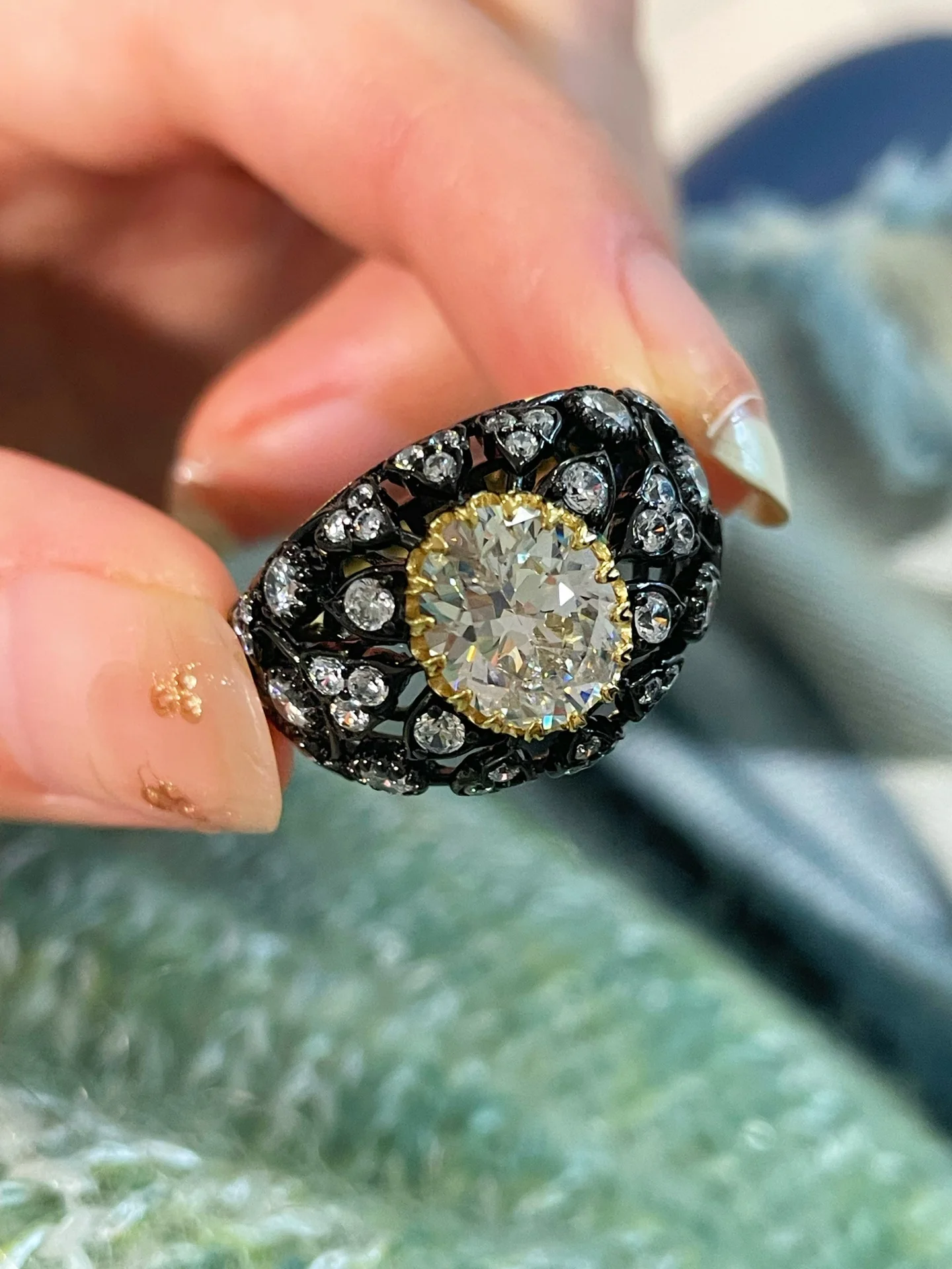 

Exquisite Oversized imitation Diamond Ring with Hollow Laurel Leaf Design in Black Rhodium Plated Silver-Rivals Fine Jewelry