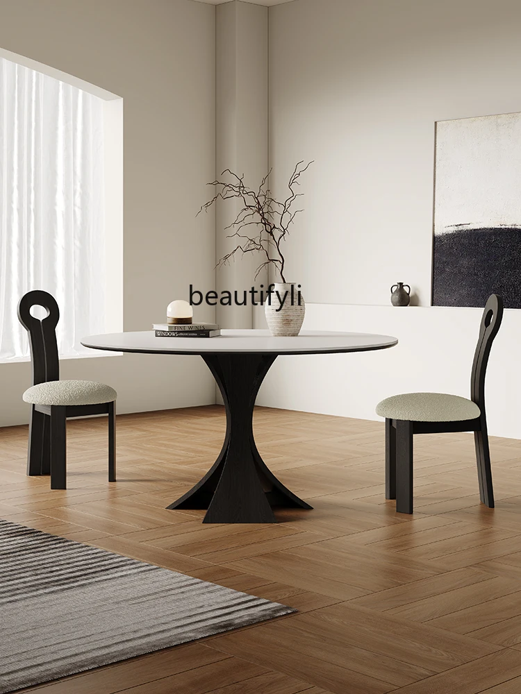 

French retro round black and white rock slab dining table and chairs minimalist light luxury high-end household dining table