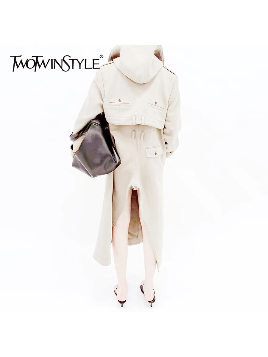 

TWOTWINSTYLE Loose Spliced Buttons Temperament Trenchs for Women Hooded Long Sleeves Tunic Patchwork Belt Split Trench Female