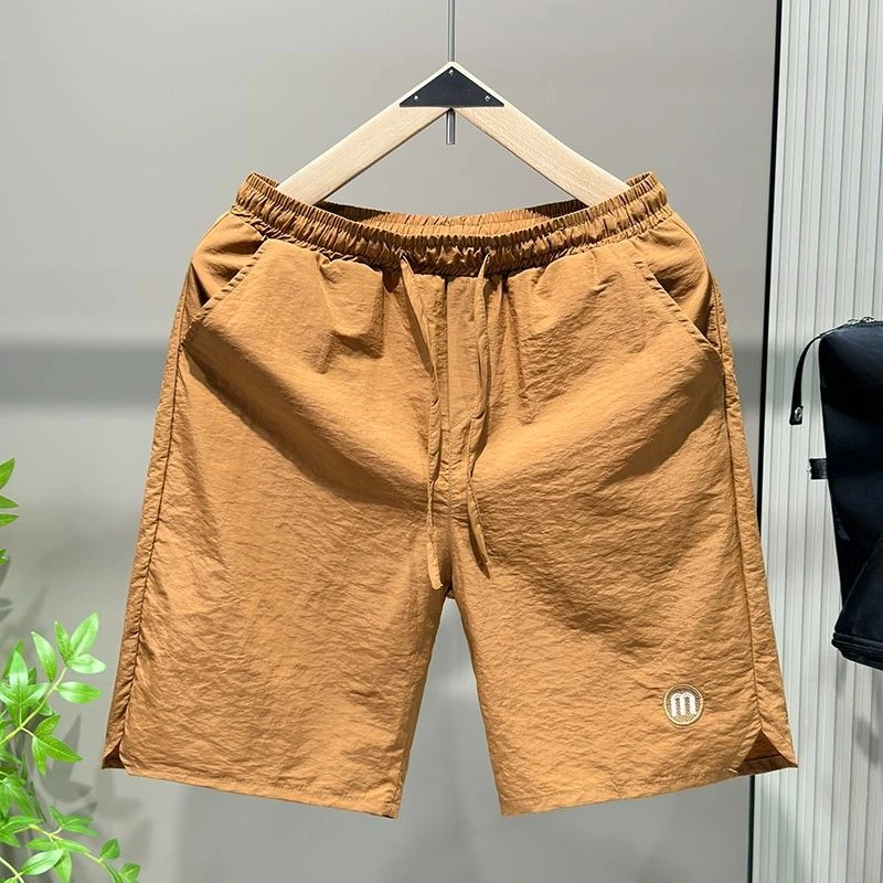 Ice Silk Cooling Quick-Dry Men's Shorts Summer 2026 Trendy Beachwear for Students Stylish Outdoor Shorts with Elastic