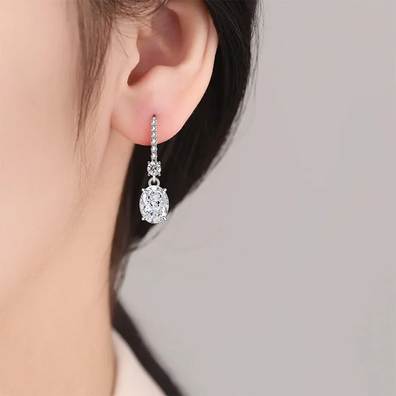 925 Reines Silber Bestseller Eisblumen-Schliff Taubenei-Form Dynamischer Ohrhänger mit schillernden High-Carbon-Diamant-Ohrringen für Damen. – Detail 4