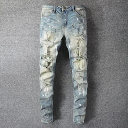 Pantalones Vaqueros elásticos para Hombre, pantalón estilo Hip Hop, diseño de agujeros rasgados, Patchwork de salpicaduras de tinta, alta calidad