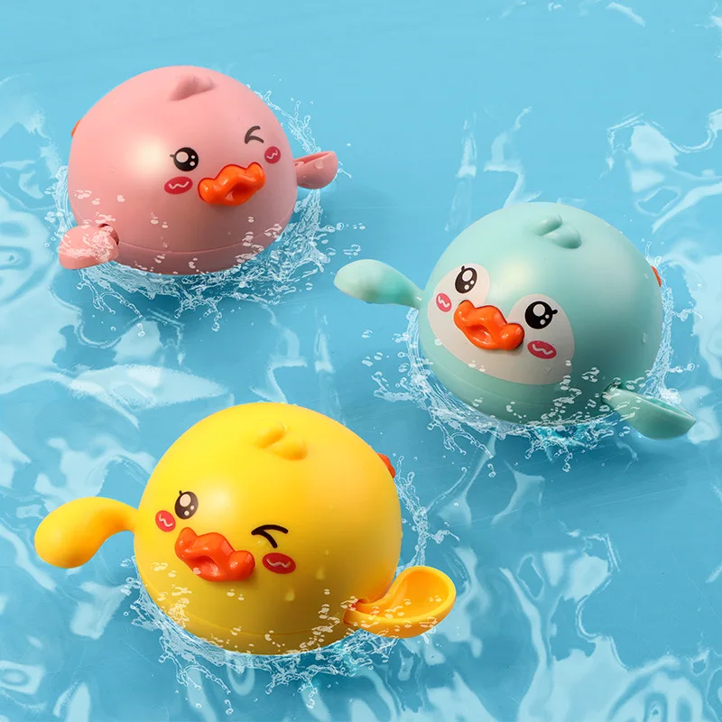 Children splashing in the water, ducklings, baby baths, baths, yellow ducks, swimming, fishing, boy and girl toys