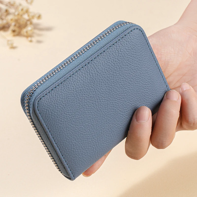 

Женский кошелек SCHLATUM из натуральной кожи с технологией блокировки RFID
