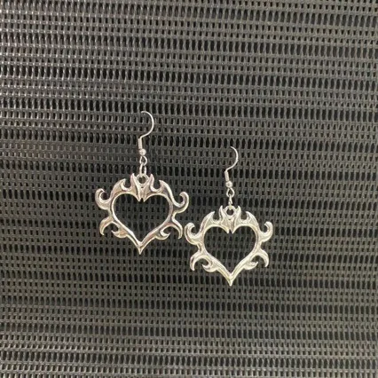 Ladies' flame heart hollow earrings with exaggerated personality, niche punk style earrings