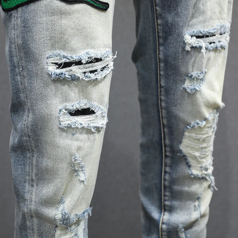 جينز Ashion Men'sy2k مع ثلاثة رؤوس بنمط ثعبان مرن وقابل للتمدد بقصة ضيقة مغسول باللون الأزرق الفاتح للرجال الهيب هوب ريت