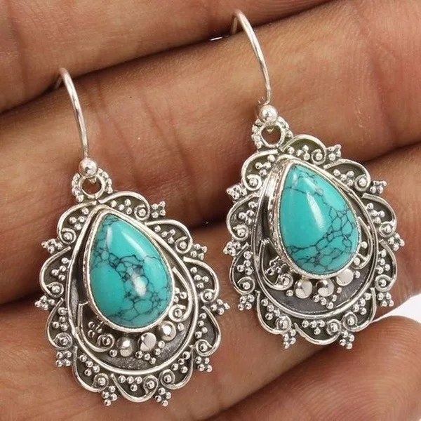 

New turquoise water drop pear-shaped silver earrings, European and American retro Thai silver-plated silver earrings.