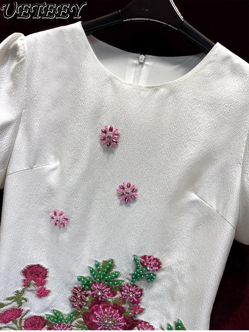 Senso di fascia alta Unico Industria pesante Perline Abito jacquard a maniche corte che riduce l'età Temperamento eleganza femminile Nuovi abiti