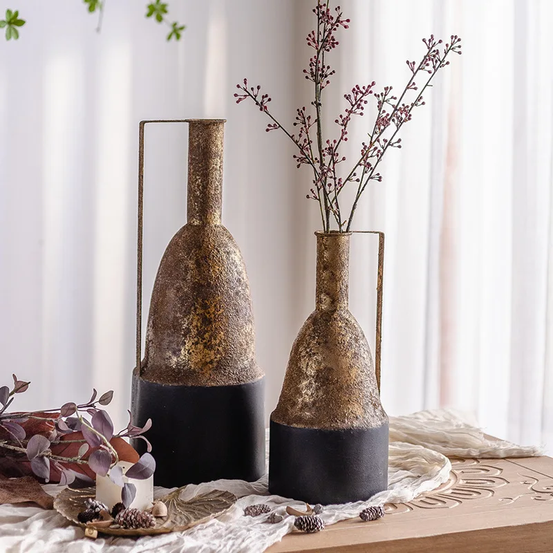 Antique and oversized antique metal floor vase in the farmhouse