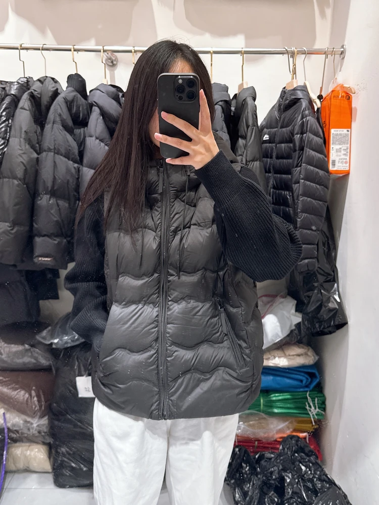 2025, wintermode nieuwe dames donsjack met capuchon, commuter splitsen, gebreide mouwen, lichtgewicht jack