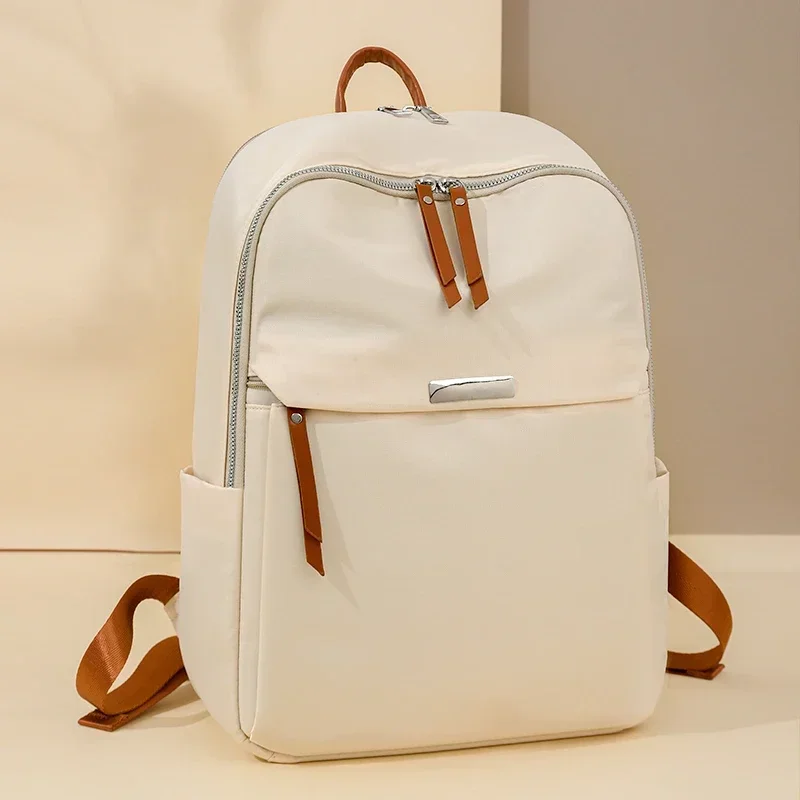 Solid Color Nylon Soft Handle Zipper Backpack Large Capacity Designer Handbag 2025 Hot Sale Air Cushion Strap Casual School Bags