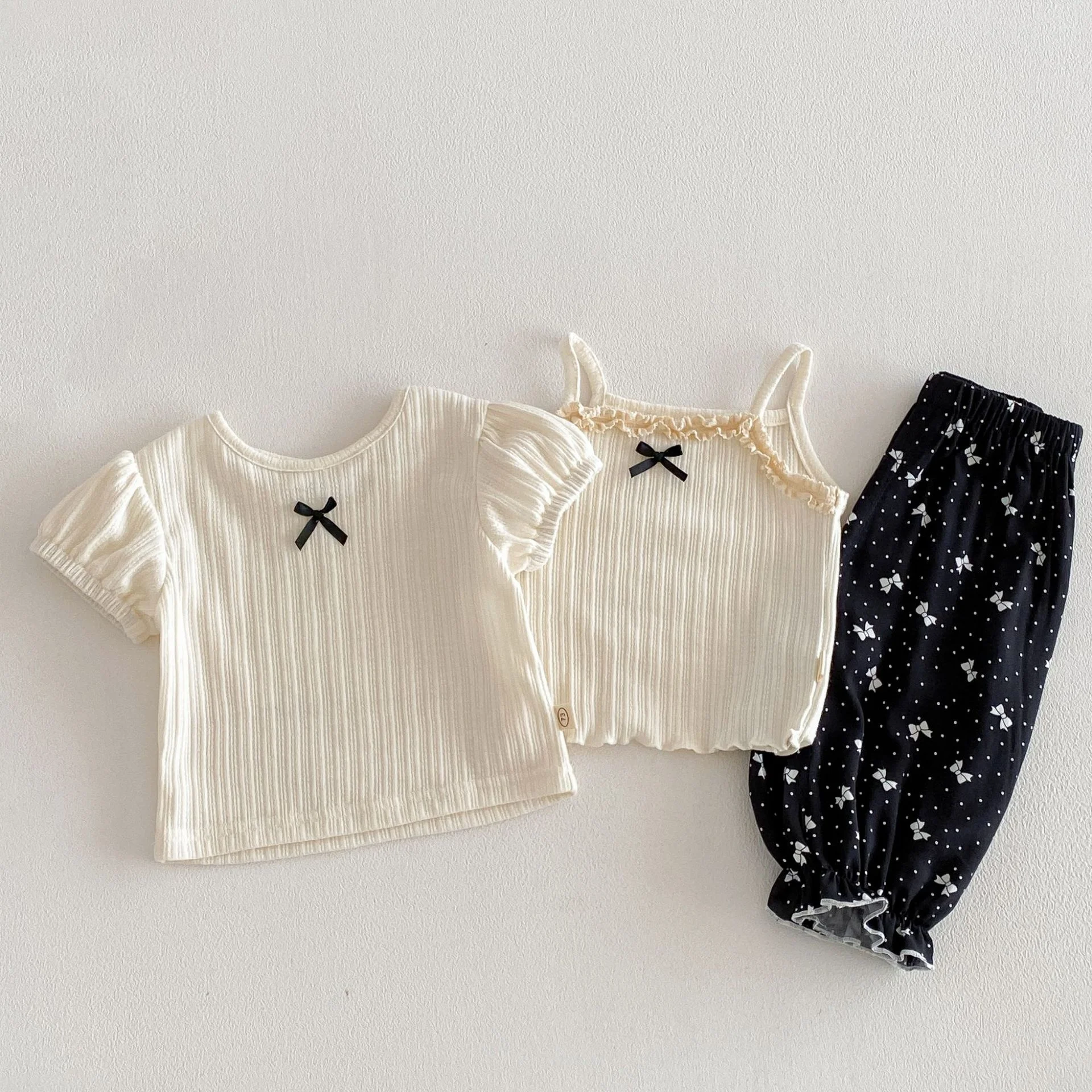 

2026 New Summer Cute Children T-shirt Black Bow Beige Short Sleeve Blouse for 6M-4Y Girls Puff Sleeve Kids Clothing