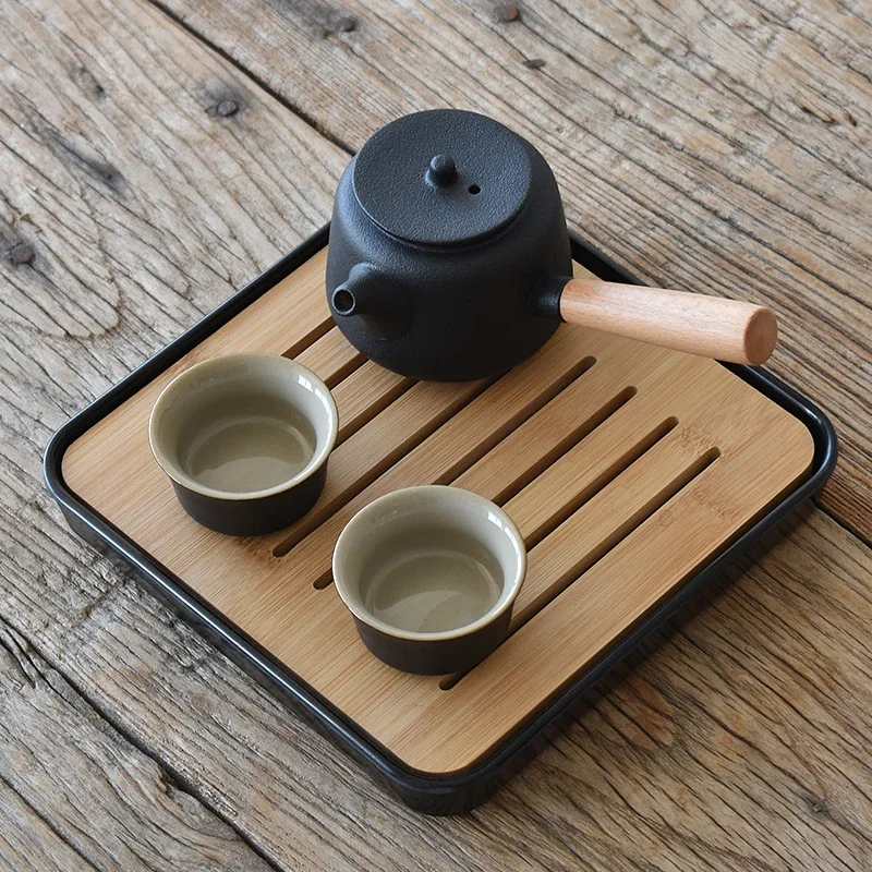 

Black pottery teapot, teacup, small set, tea, side handle, pot, one pot, two cups, four cups, single household