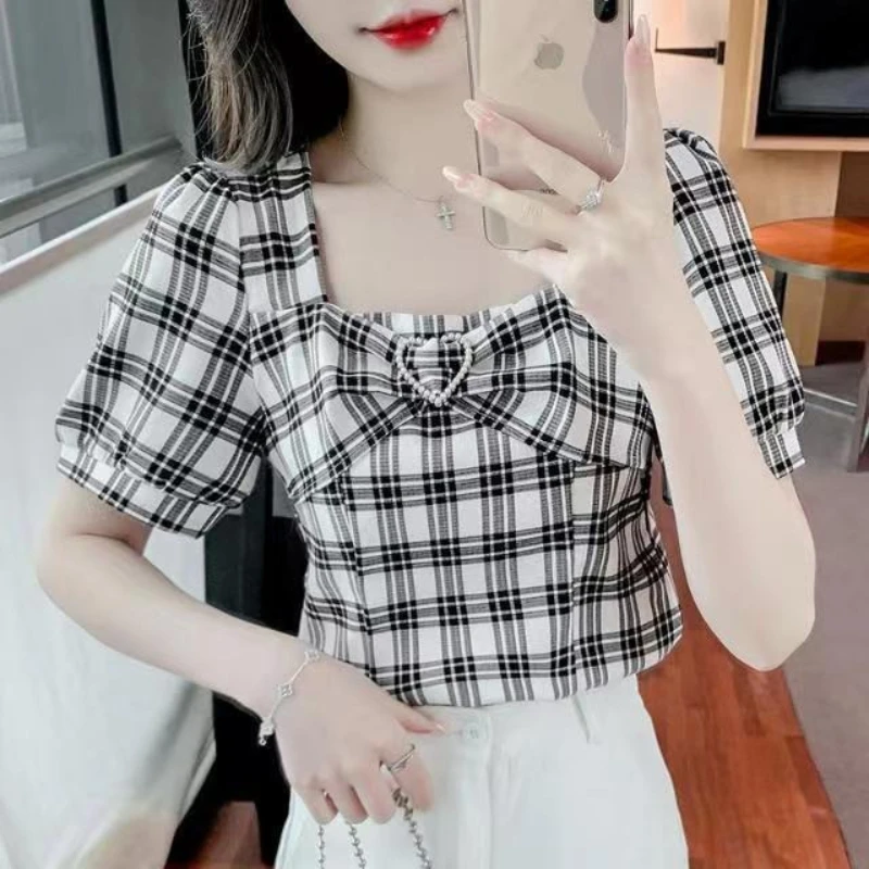 

Женский летний топ 2026 года: новинка, в клетку, с короткими рукавами-фонариками, в нишевом французском стиле, с дизайнерским акцентом