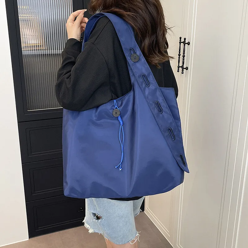 

New Niche Design Button Fashion Versatile Simple Single Shoulder Crossbody Tote Large Capacity Shopping Commuter Bag