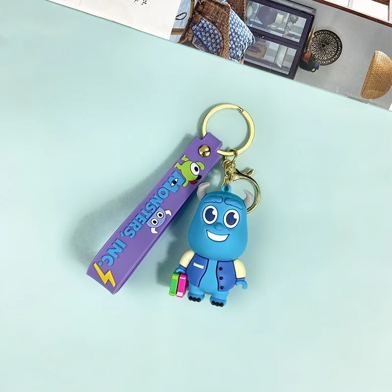 Creative cartoon monster power company keychain shaggy monster monocle chameleon key chain men and women pendant