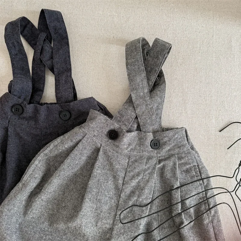 2025 ربيع ملابس الأطفال ملابس الربيع الأطفال النسخة الكورية حزام السراويل نحى تسعة سنت السراويل بنطال ذو قصة أرجل واسعة