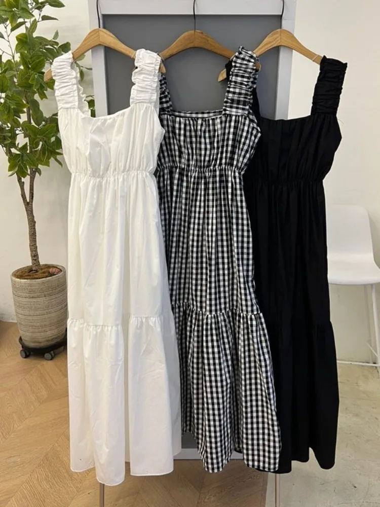 فستان منقوش باللونين الأبيض والأسود بدون حمالات للنساء بخصر فضفاض تنورة متوسطة الطول لربيع الخريف موسم الخريف منتج صيني بدون ...