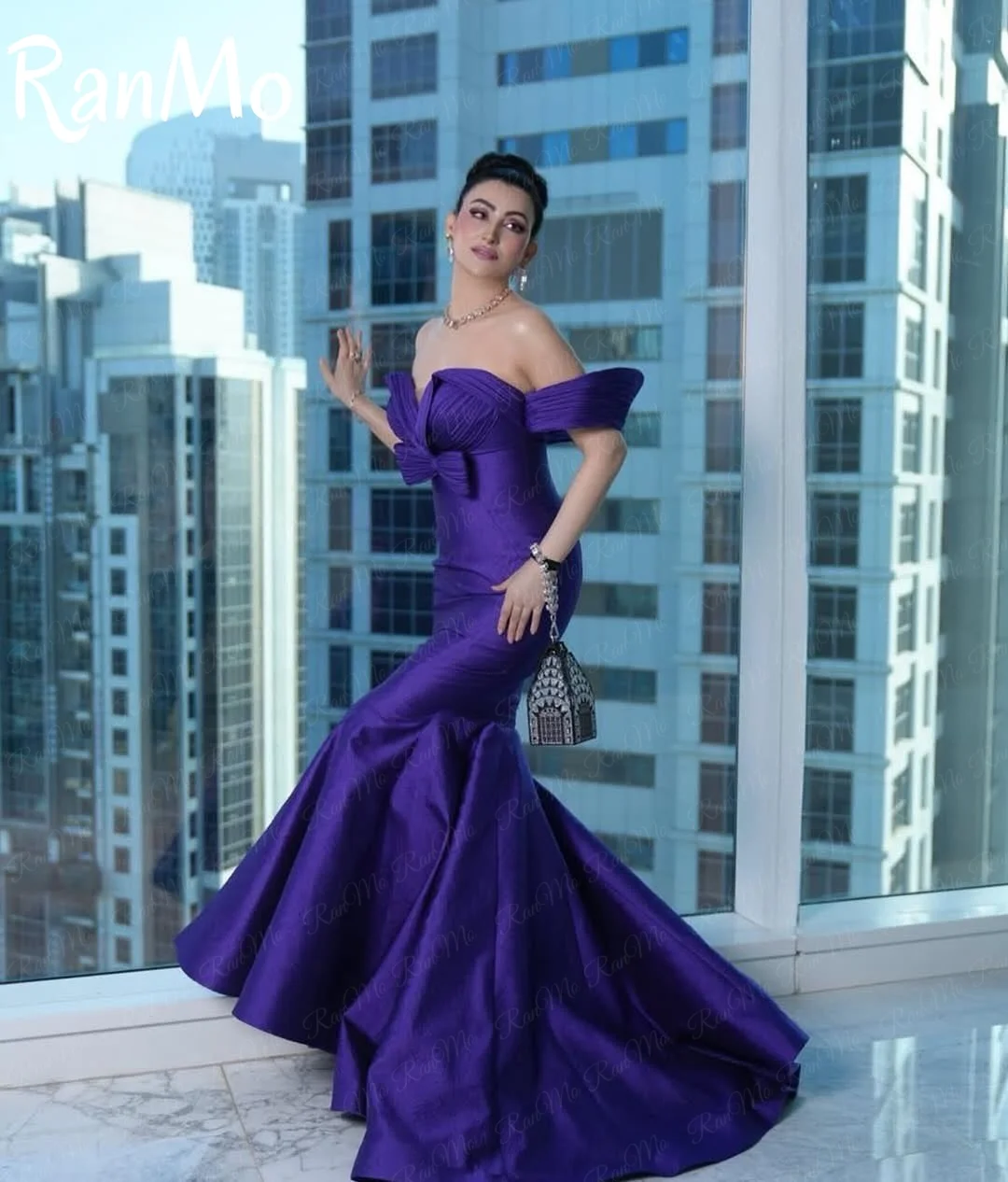 فستان سهرة Ranmo 2025 أنيق أرجواني بدون أكتاف مع فيونكة مخصصة بدون أكمام مع فيونكة دبي حورية البحر مناسبة للحفلات الراقصة