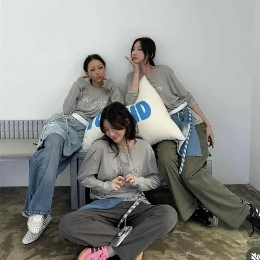 حماية من الشمس طويلة Sve مستديرة Ne T-irt Faionable حبة لون نقي رقيقة الخريف المرأة عادية Sle فضفاض تي شيرت مجسم