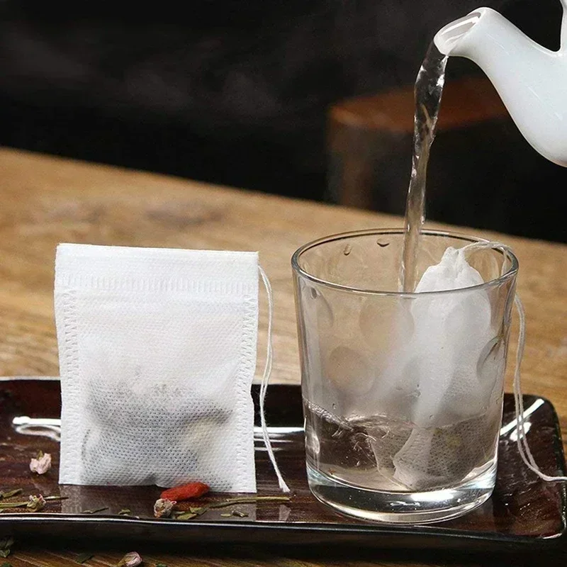 100 Stück Einweg-Tee filter beutel Teebeutel aus Vliesstoff mit Kordel zug Küchen tee Filterpapier für Kaffee kraut loser Tee