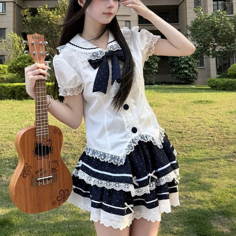 

2026 Japanese Kawaii Polka Dot Lace Bow Puff Sleeve Tiered Mini Skirt 2 Piece JK Uniform Set Women Navy White Daily Wear Outfit