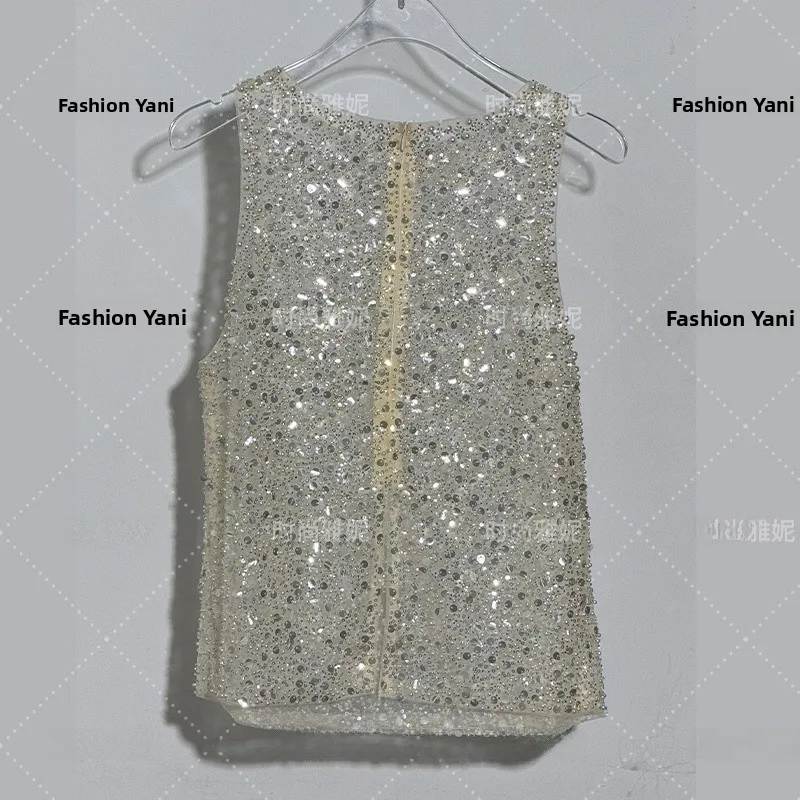 

Faionable Yan Heavy Work Sequin Svel Vest Top Women Sexy Spicy Pearl Embellied Beige Small irt Commute Sle Slim...