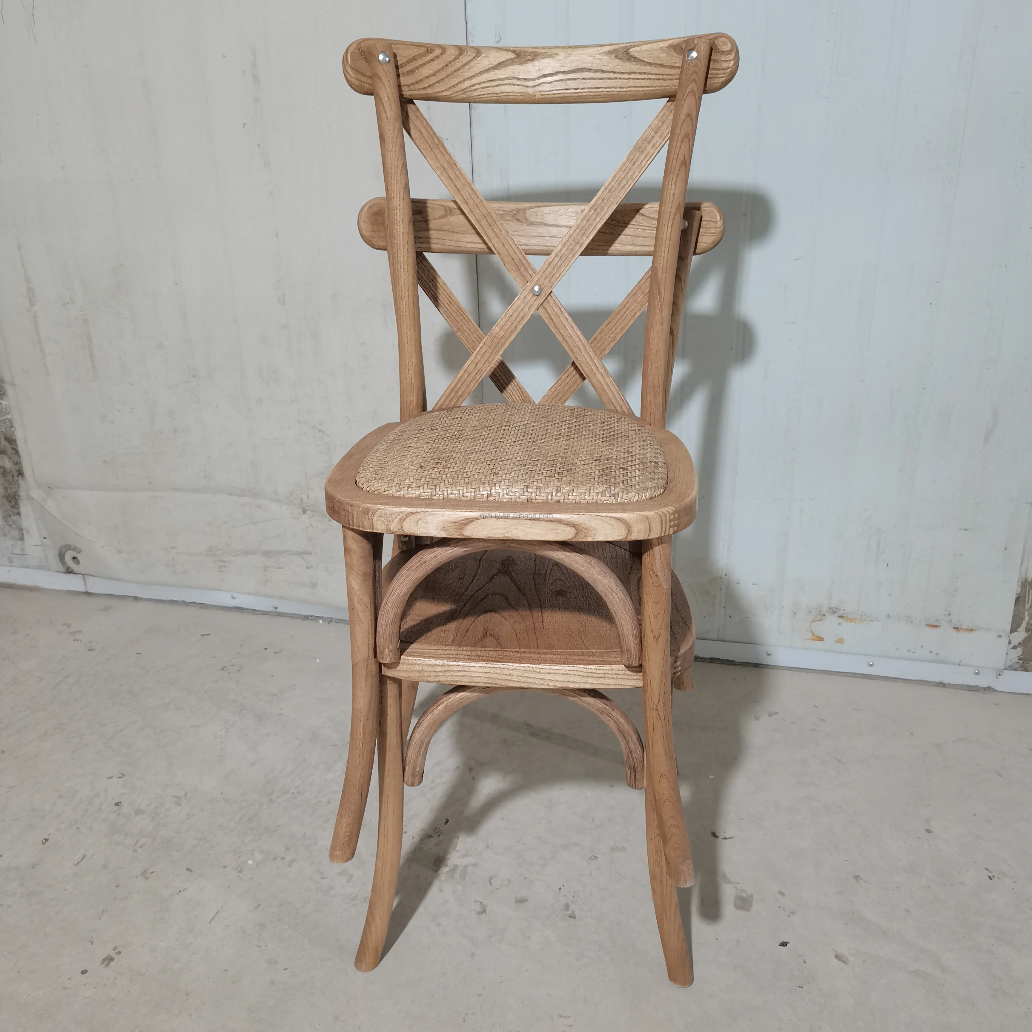 Hot sale wholesale wedding party wooden stackable KD cross back bentwood chair  with rattan cushion and solid wood seat