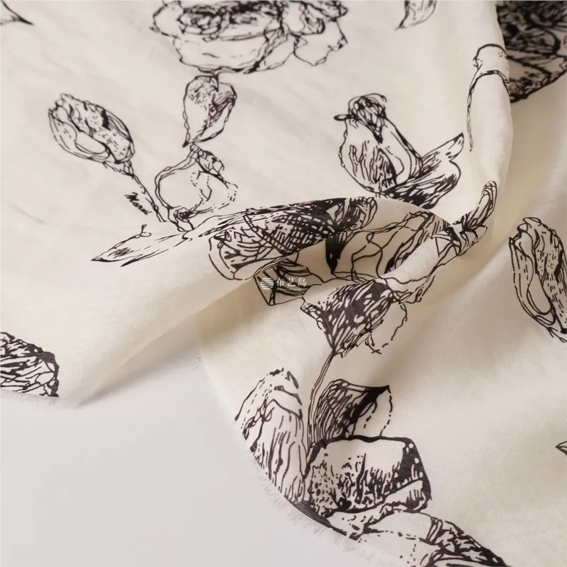 Thin slightly translucent beige base ink-style printed cotton and linen blended fabric for shirts skirts trousers