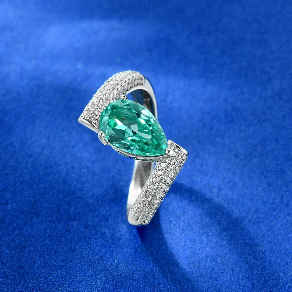 

2025 Новое кольцо Water Drop Paraiba 7*11 Ice Flower Cut 1,5 карата с инкрустацией бриллиантами в европейском и американском стиле Ins