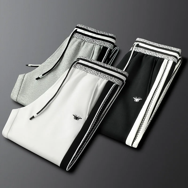 

Простые и спортивные мужские повседневные брюки, облегающие прямые брюки в черную полоску сбоку, спортивные штаны на шнурке, толстый стиль.