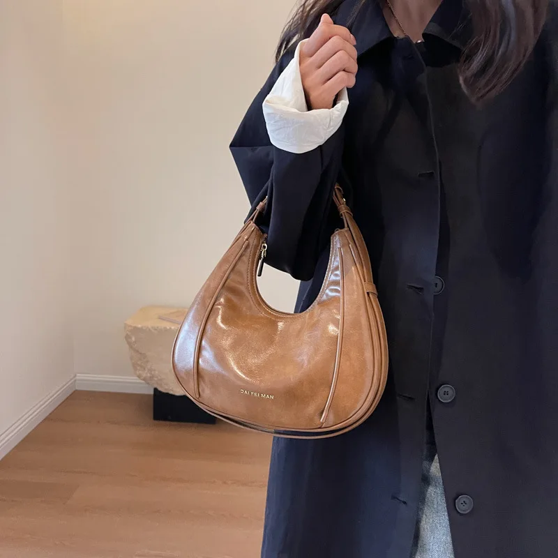 

Saddle Baguette Crossbody Bag Vintage Commuter Purse Distressed Leather Top Handle Gallery Hopping Ready Minimalist Chic Style