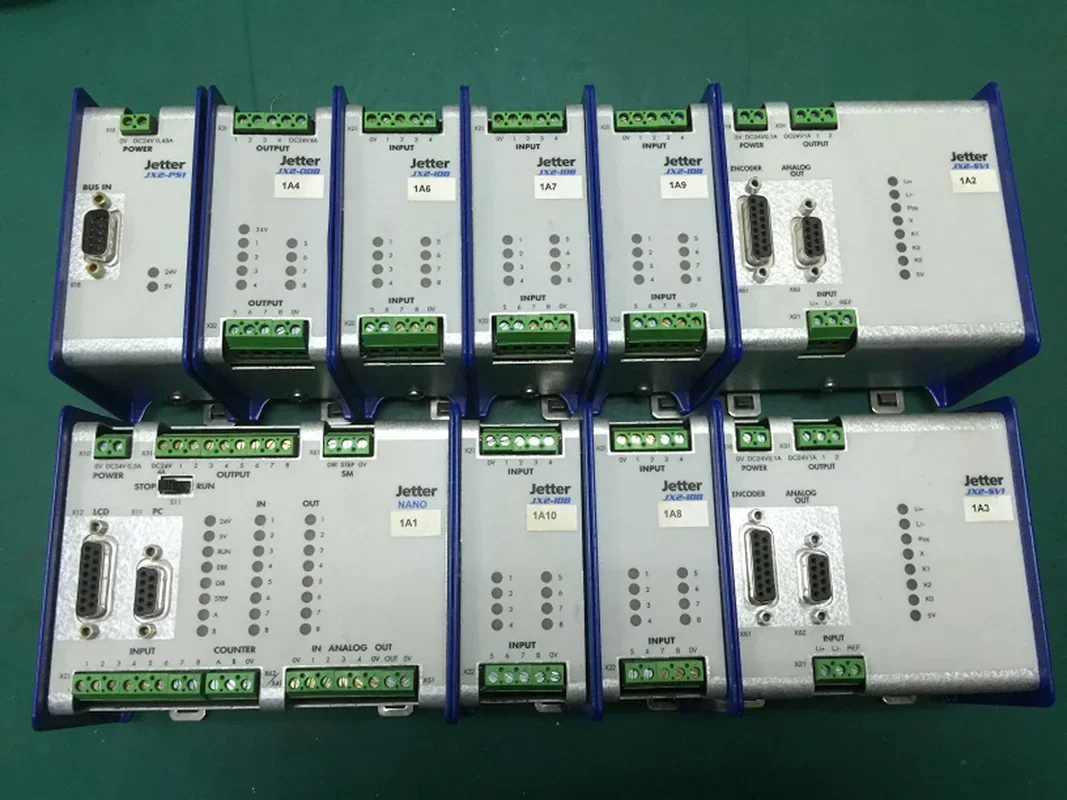 JETTER JX2-NC-CPU JX2-ID8 JX2-OD8 JX2-PS1 JX2-SV1 PLC Module Used