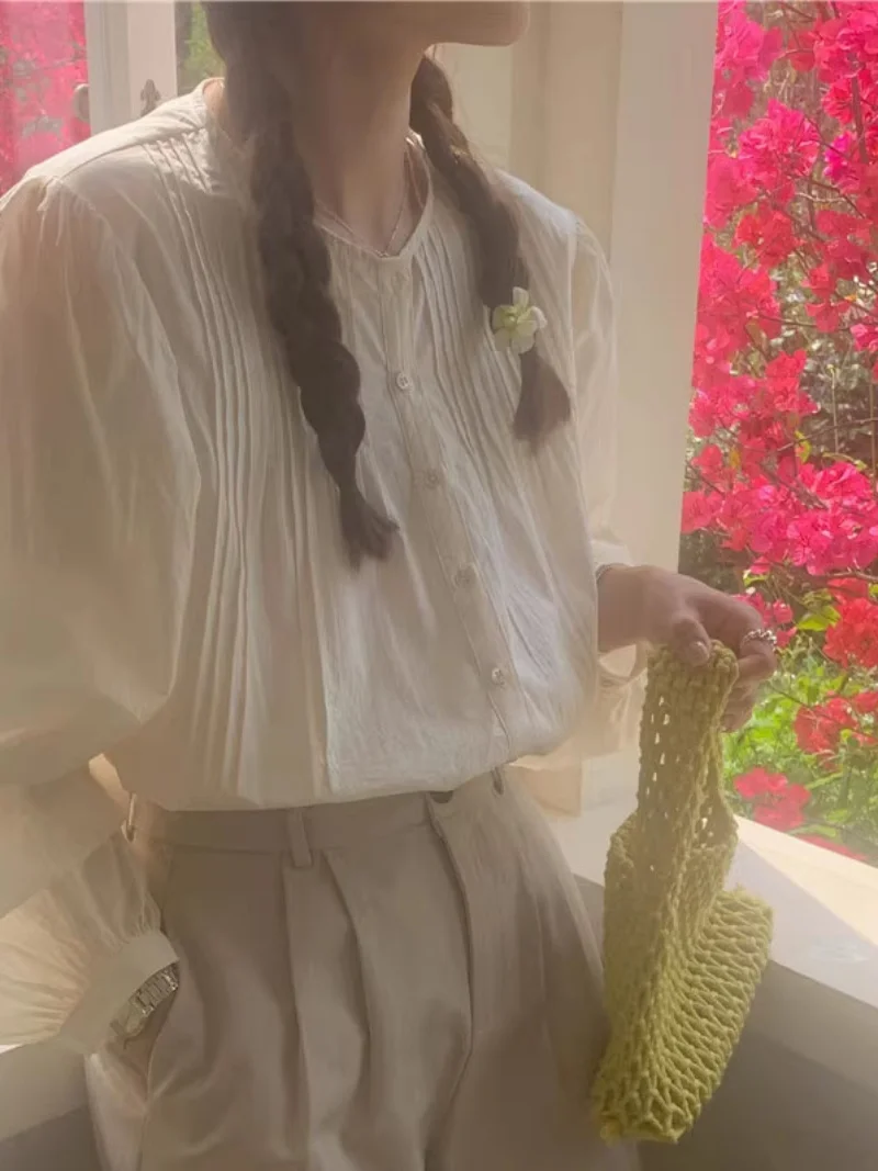 Chic Sweet round Ne Long Sve Loose Women's irt Design Sensation Bubble Sve Spring Top Korean Sle Commute Pure Color