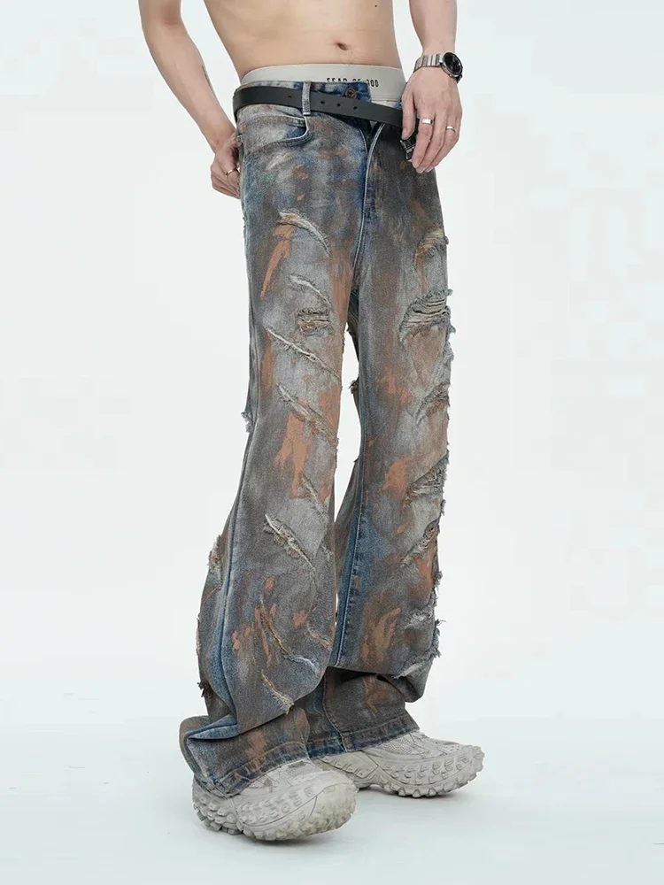 

American yellow mud jeans for men, autumn wasteland trendy brand street niche men with holes painted and old pants