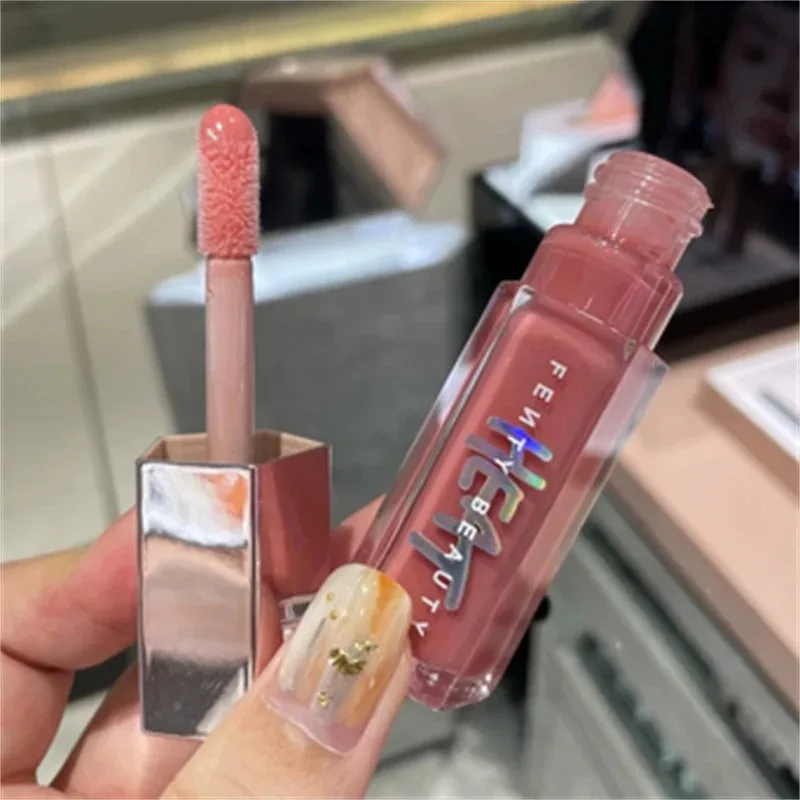 ลิปกลอส Fenty Beauty Gloss Bomb หลายสี ให้ความชุ่มชื้น เงางาม ประกายวิ้ง ลิปพลัมเพอร์ สำหรับมือใหม่ ลิปสติกเนื้อลิควิด เครื่องสำอาง