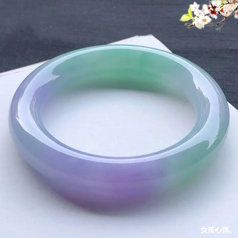 Natural Burmese round , a delicate bracelet for young women featuring ice- smooth jade with spring-like hues