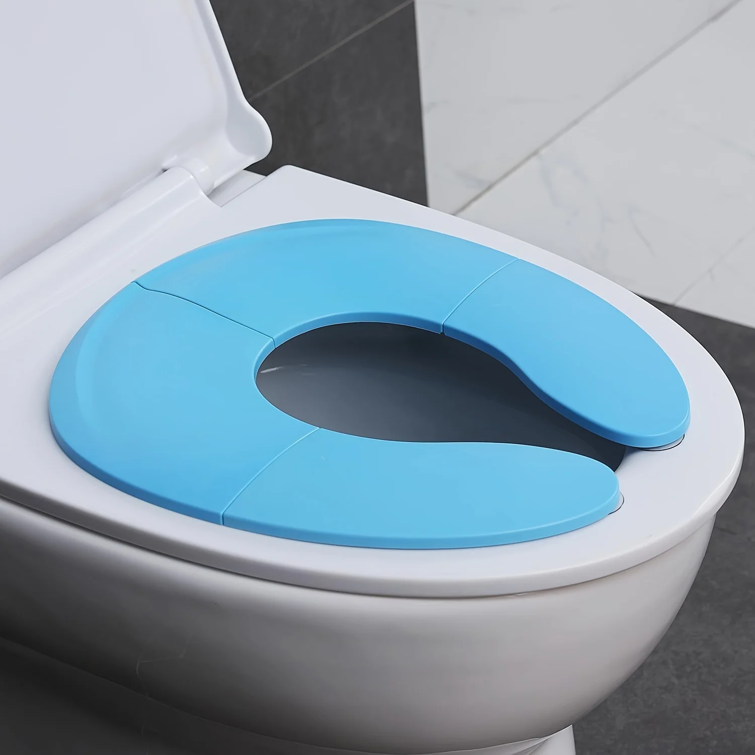 Portable & Foldable Baby Potty Seat with Non-Slip Suction Cups - Toilet Seat Travel Essential