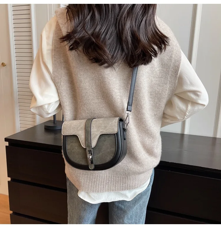 

French niche bag women's 2025 new high-end foreign-style shoulder messenger bag color matching saddle bag
