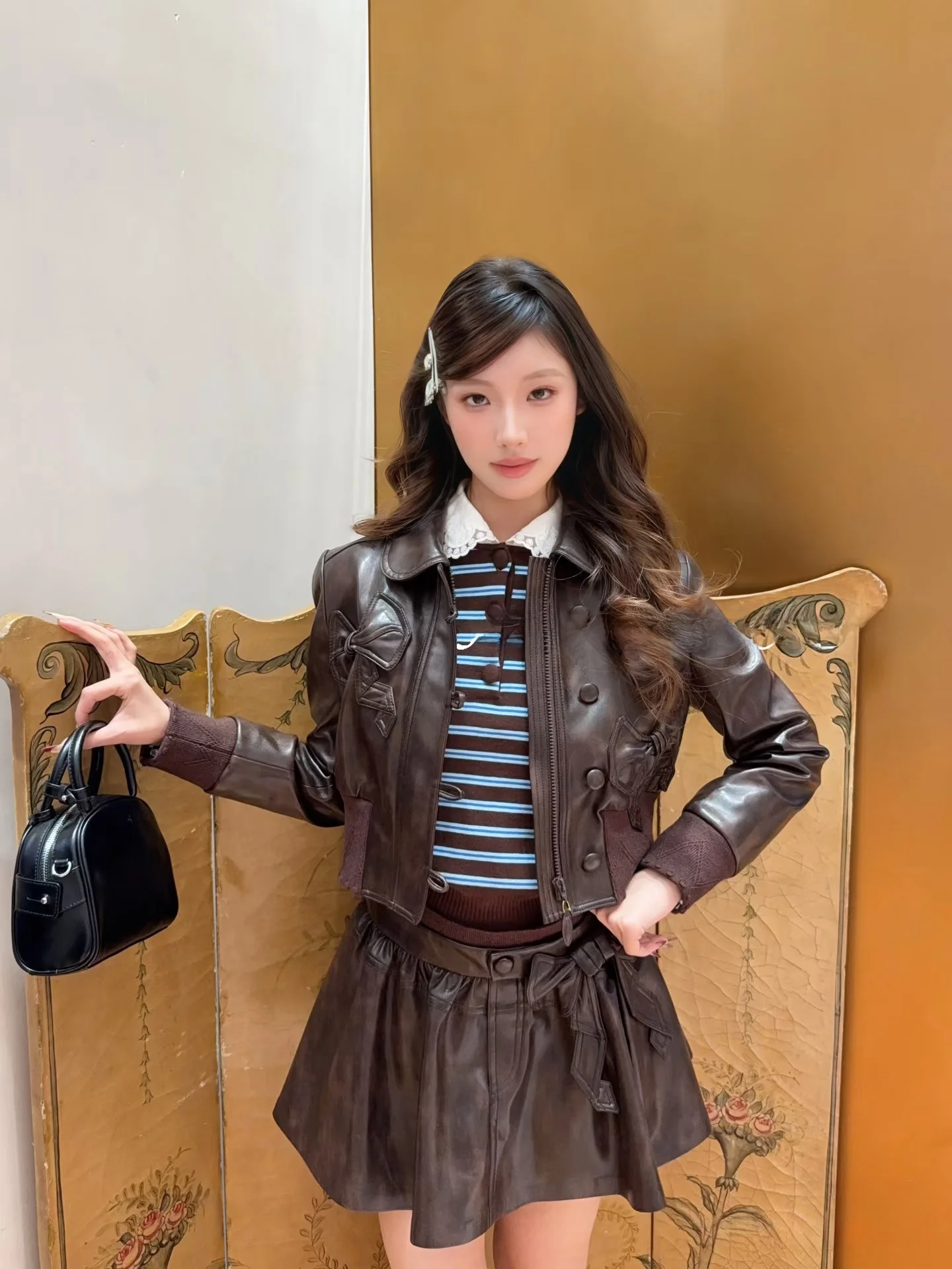 

JONI Early Spring Heavy Work Washed 3D Knot Decoration Leather Jacket plus Half Skirt Coffee Color Series Fashion Set