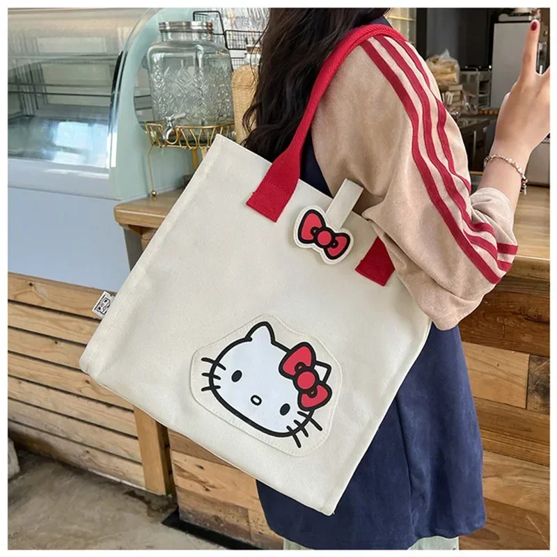 

Sanrio hello kitty cute cartoon canvas shoulder bag girl large capacity kuromi travel tote storage bag student schoolbag