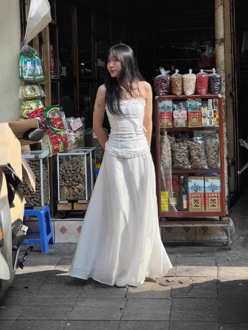 

Комплект из топа-безрукавки в стиле пэчворк и длинной юбки: повседневный наряд, прямые брюки-трубы со средней/заниженной талией из ПВХ, однотонные.