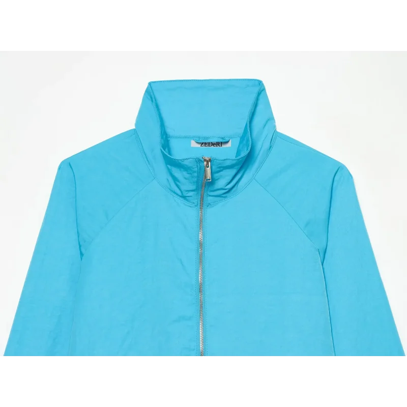Damen-Cropped-Jacke mit durchgehendem Reißverschluss, Stehkragen, Raglanärmeln, elastischen Bündchen, aus technischem Stoff, leicht, windabweisend, Freizeitjacke – Detail 9