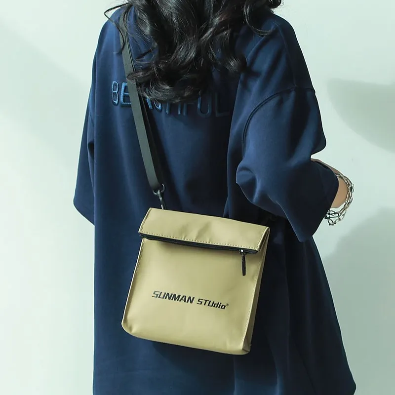 bolso-bandolera-unisex-minimalista-estilo-japones-bolso-de-hombro-moderno-mochila-de-diseno-simple-y-versatil-para-hombres